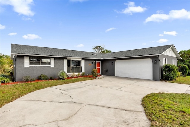 single story home featuring a garage