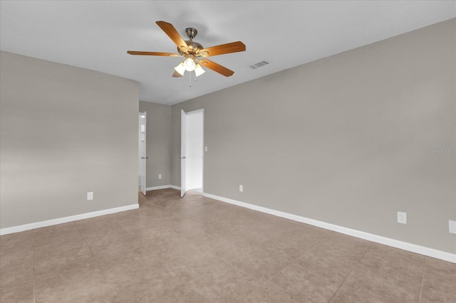 spare room with ceiling fan