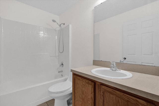 full bathroom featuring tile patterned floors, toilet, shower / bathing tub combination, and vanity