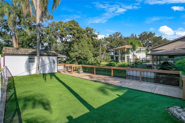 view of yard with a wooden deck