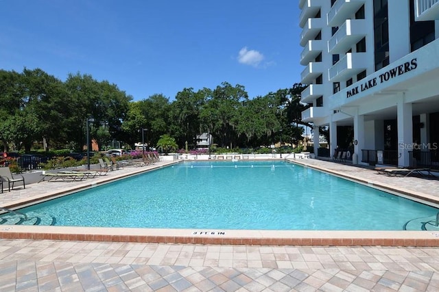 view of swimming pool with a patio area