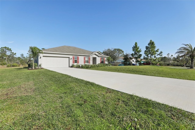 ranch-style house featuring a garage and a front lawn