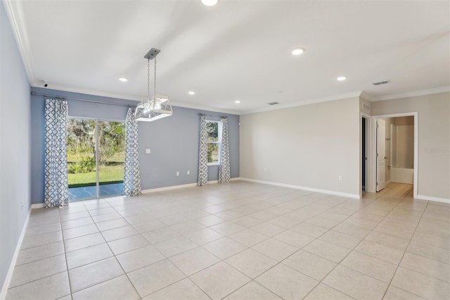 tiled empty room with plenty of natural light and ornamental molding