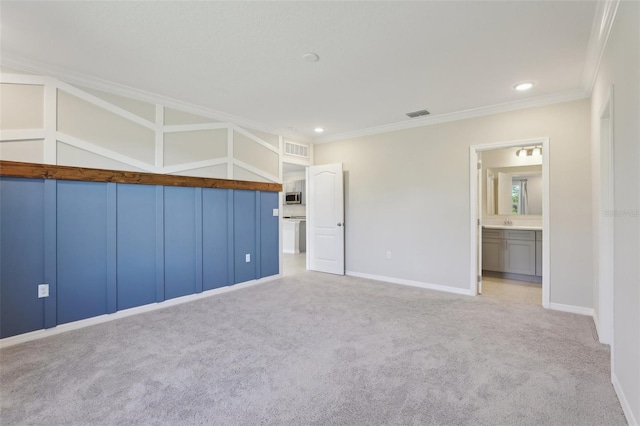 spare room featuring light carpet and ornamental molding