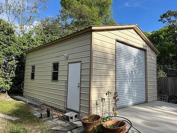 view of outdoor structure featuring a garage