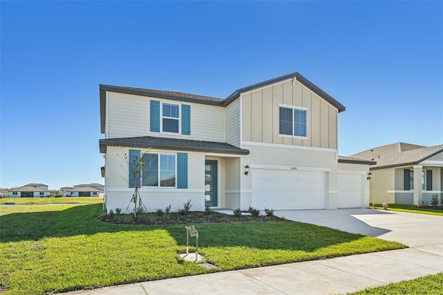 view of front of house with a front lawn and a garage