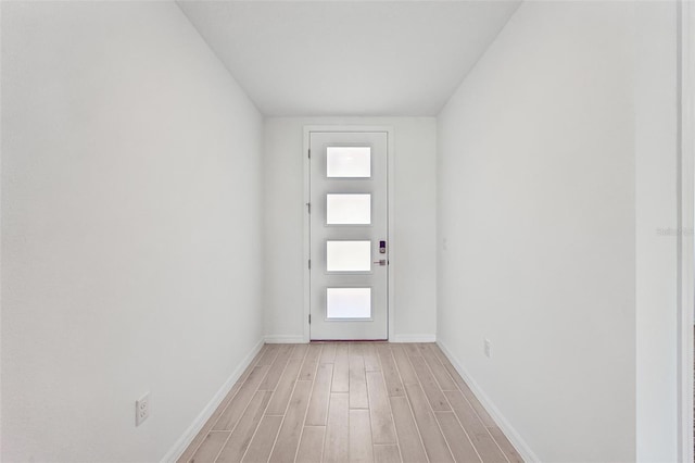 doorway to outside featuring light hardwood / wood-style floors