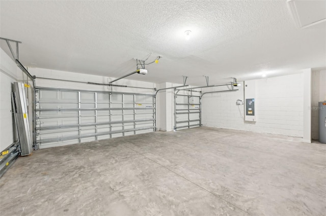 garage featuring electric panel, a garage door opener, and water heater