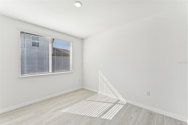 empty room featuring light hardwood / wood-style floors