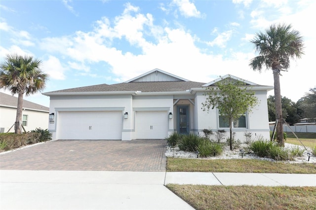 view of front of property with a garage