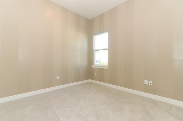 unfurnished room with carpet floors