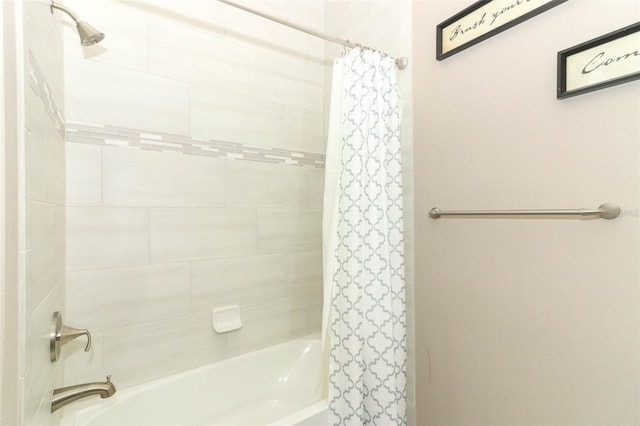 bathroom with shower / bath combo