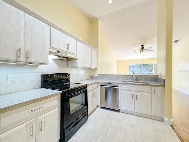 kitchen with ceiling fan, sink, black electric range, stainless steel dishwasher, and vaulted ceiling