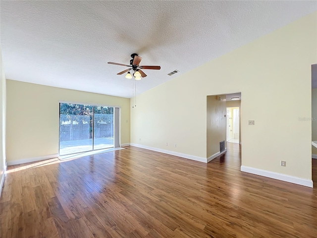 spare room with a textured ceiling, dark hardwood / wood-style flooring, and ceiling fan