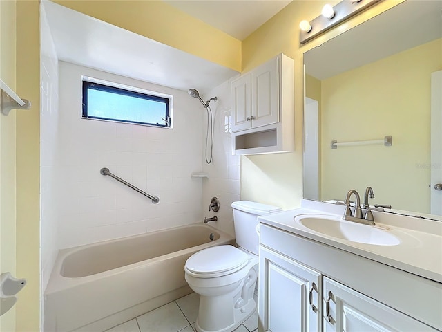 full bathroom with tile patterned floors, tiled shower / bath combo, toilet, and vanity