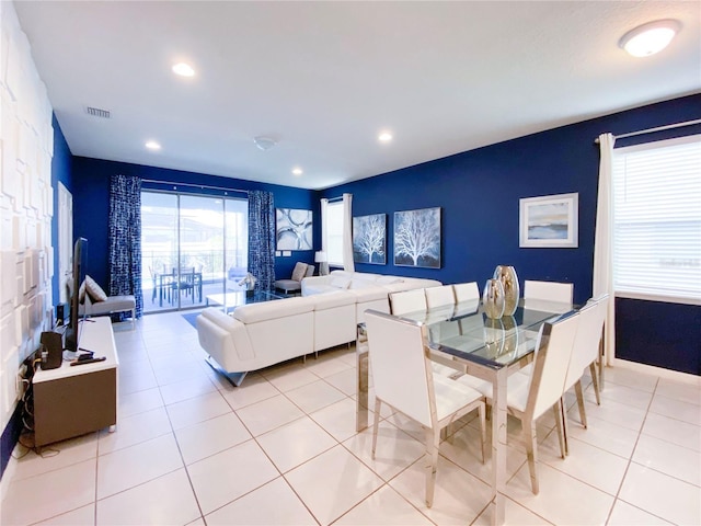 8956 Zurich Ln, Kissimmee, FL 34747 - dining room featuring light tile patterned flooring and recessed lighting