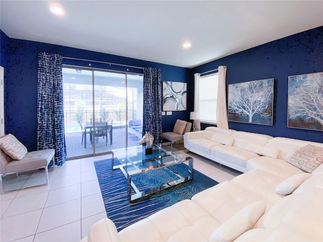 8956 Zurich Ln, Kissimmee, FL 34747 - living room with tile patterned floors, plenty of natural light, and recessed lighting