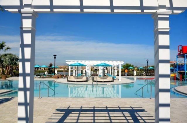 community pool featuring a patio