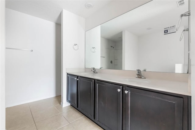 bathroom featuring vanity and tile patterned floors