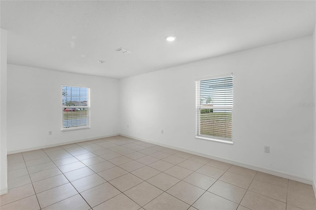 view of tiled spare room