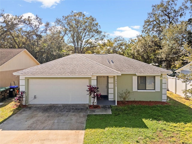 ranch-style home featuring a garage and a front lawn