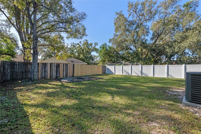 view of yard featuring central AC