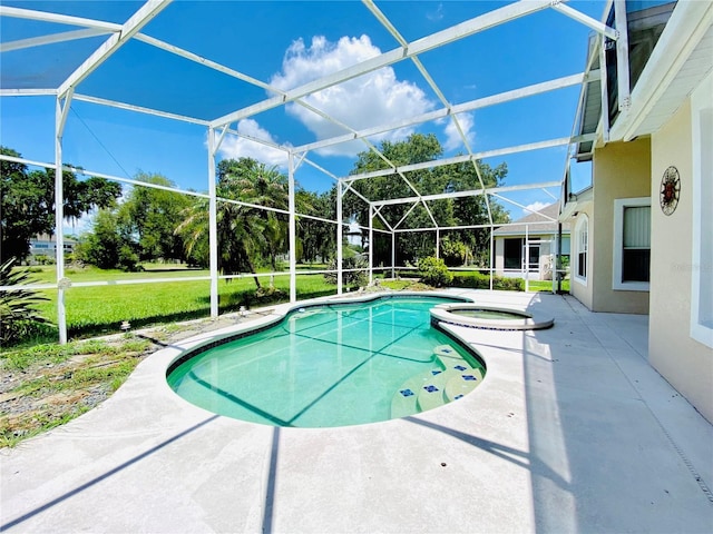 view of swimming pool with a patio area, a lanai, a yard, and an in ground hot tub