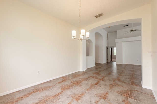 unfurnished dining area featuring ceiling fan with notable chandelier