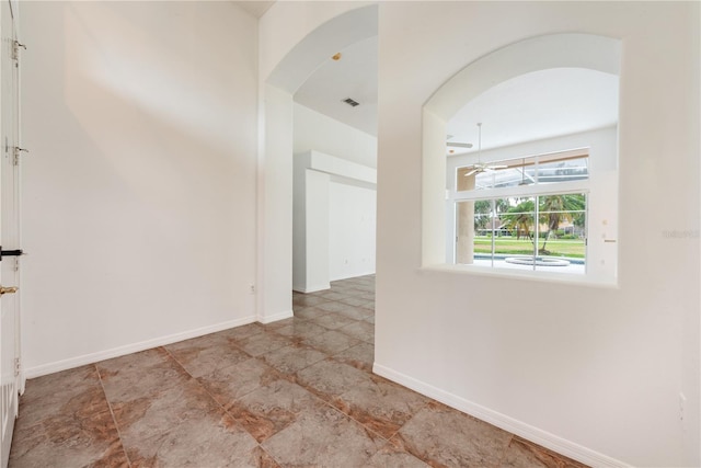 empty room featuring ceiling fan