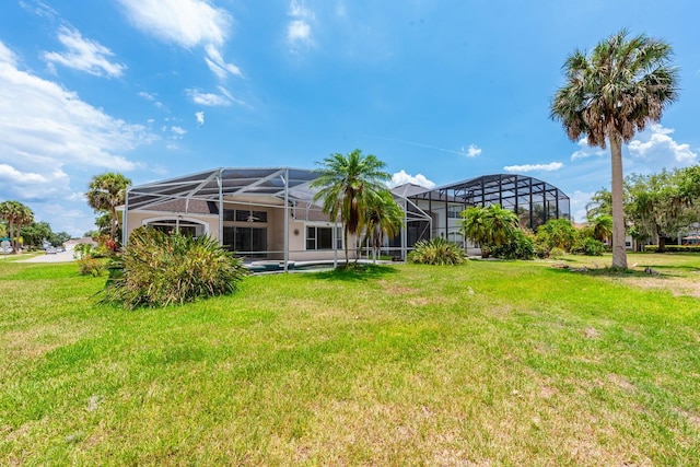 view of yard with a lanai