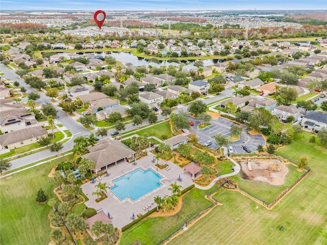 birds eye view of property featuring a water view