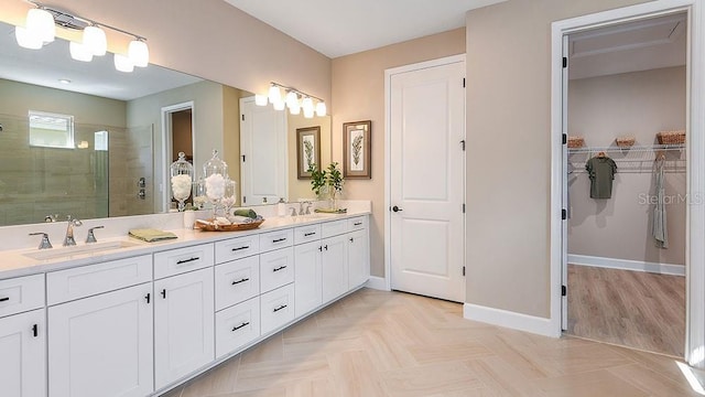 bathroom featuring vanity and walk in shower