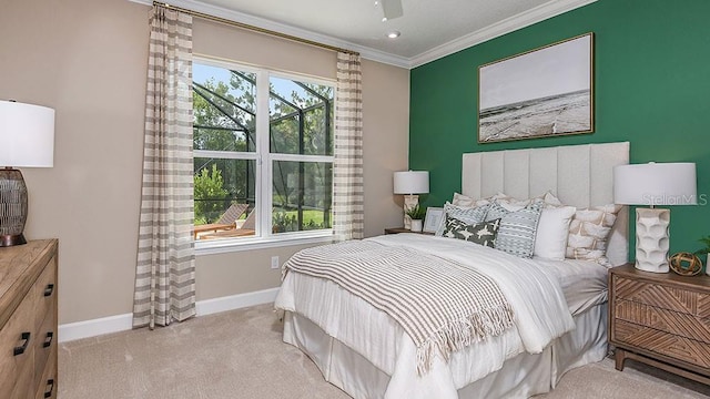 carpeted bedroom featuring multiple windows, ceiling fan, and ornamental molding