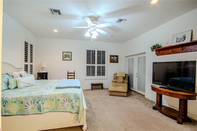 carpeted bedroom featuring ceiling fan and french doors