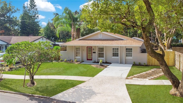 ranch-style home with a porch and a front lawn