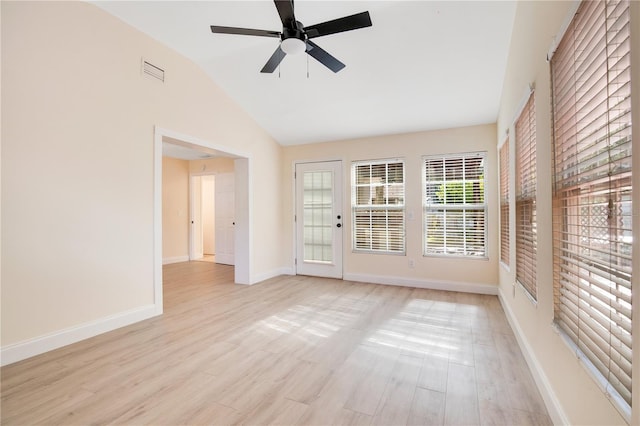 unfurnished room featuring ceiling fan, light hardwood / wood-style floors, and vaulted ceiling