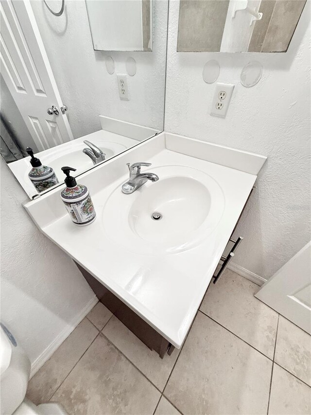 bathroom featuring vanity and tile patterned floors