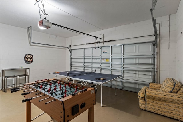 playroom featuring concrete flooring