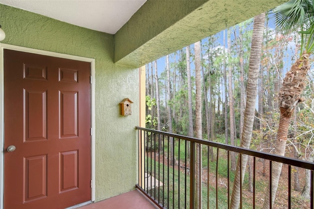 doorway to property with a balcony