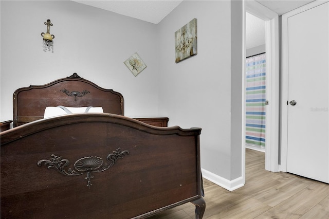 bedroom featuring light hardwood / wood-style flooring