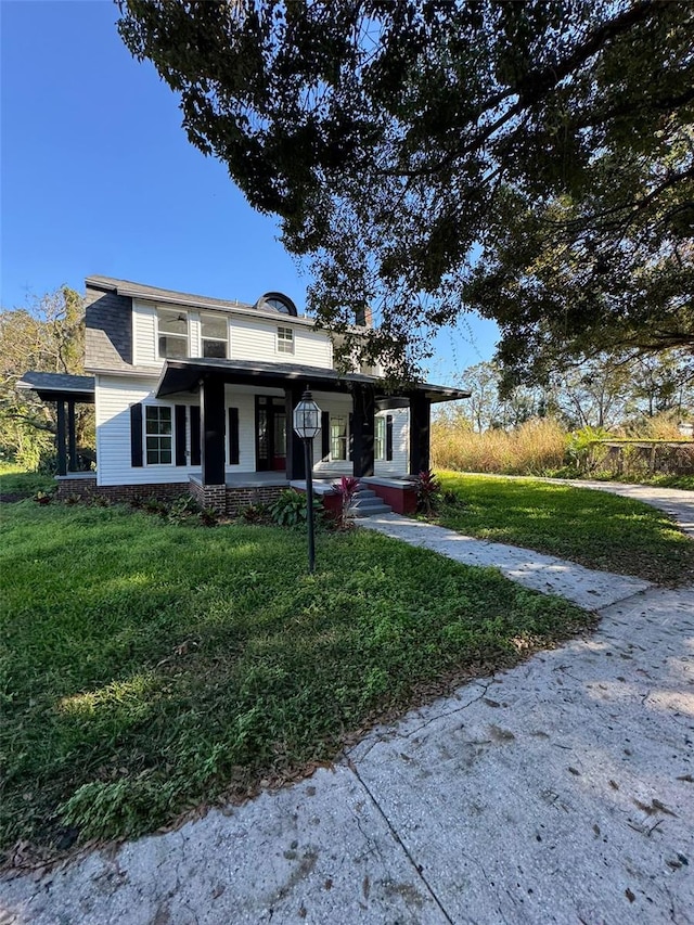 view of front of property with a front lawn