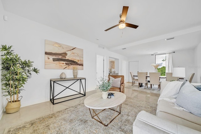 living room featuring ceiling fan