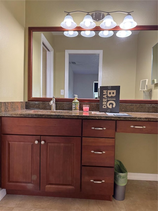 bathroom with vanity and tile patterned floors