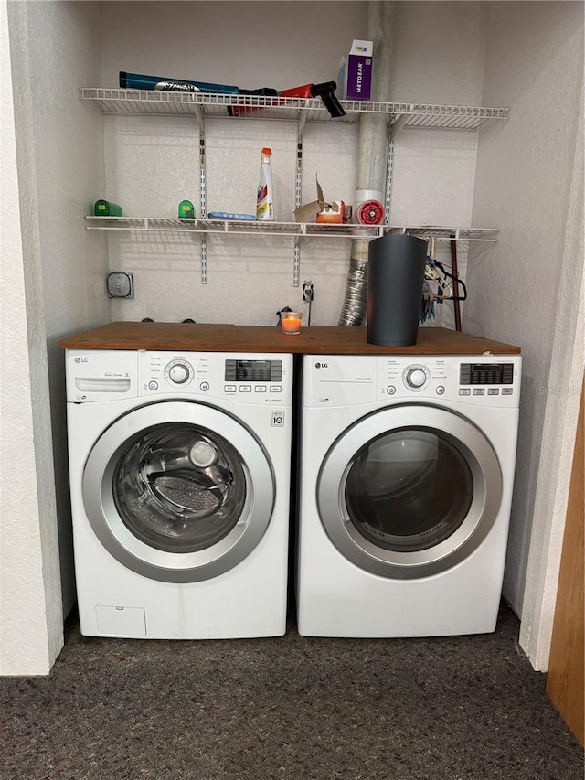 laundry room featuring separate washer and dryer