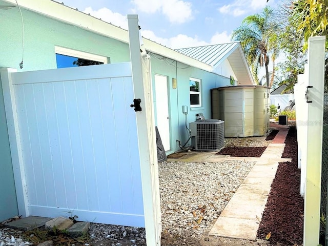 view of home's exterior featuring central AC