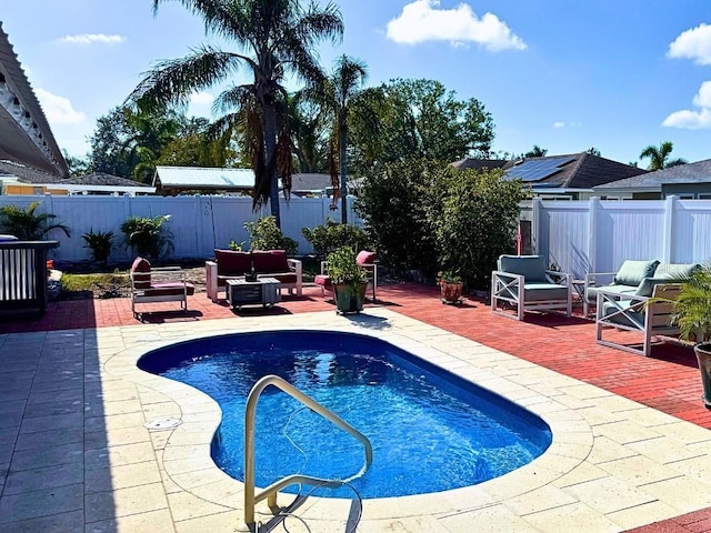 view of swimming pool featuring a patio