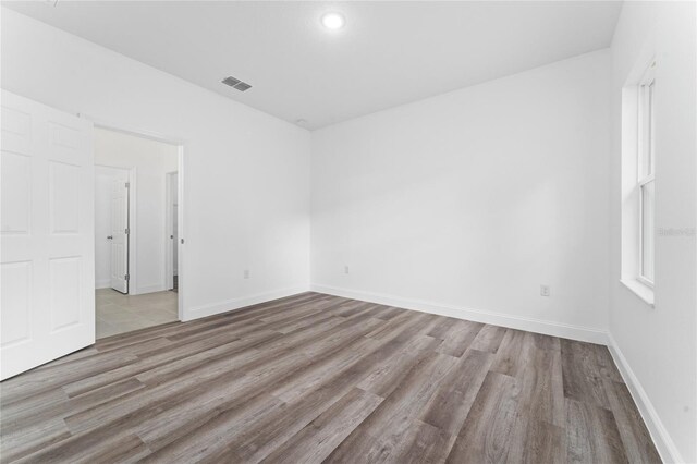 unfurnished room featuring light wood-type flooring