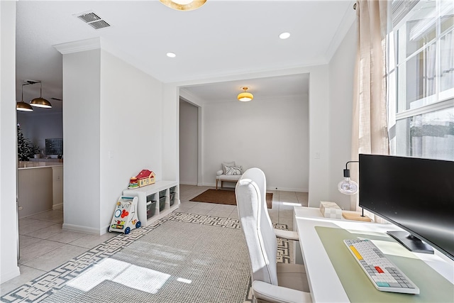 office featuring light tile patterned floors and ornamental molding