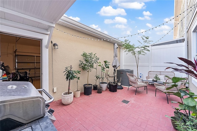 view of patio / terrace featuring an outdoor living space and cooling unit