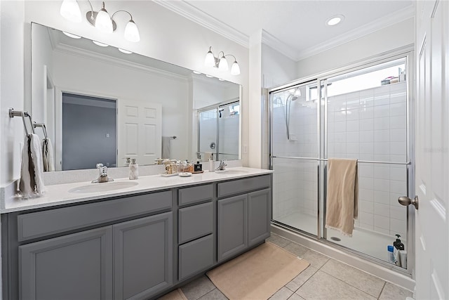 bathroom featuring tile patterned floors, vanity, ornamental molding, and walk in shower